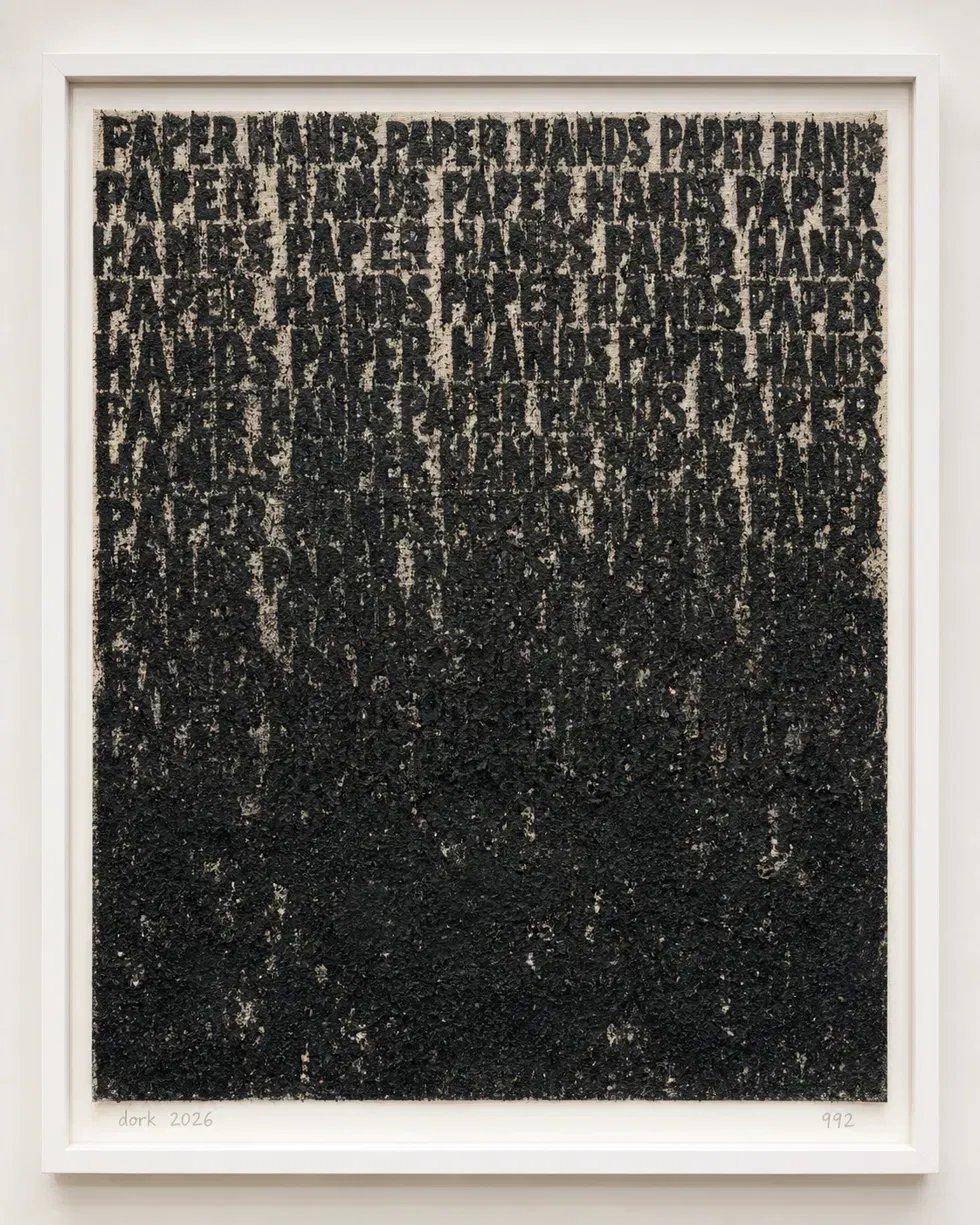 Stenciled text PAPER HANDS repeated in rows, thickening and dissolving into a black coal-dust mass toward the bottom of the canvas